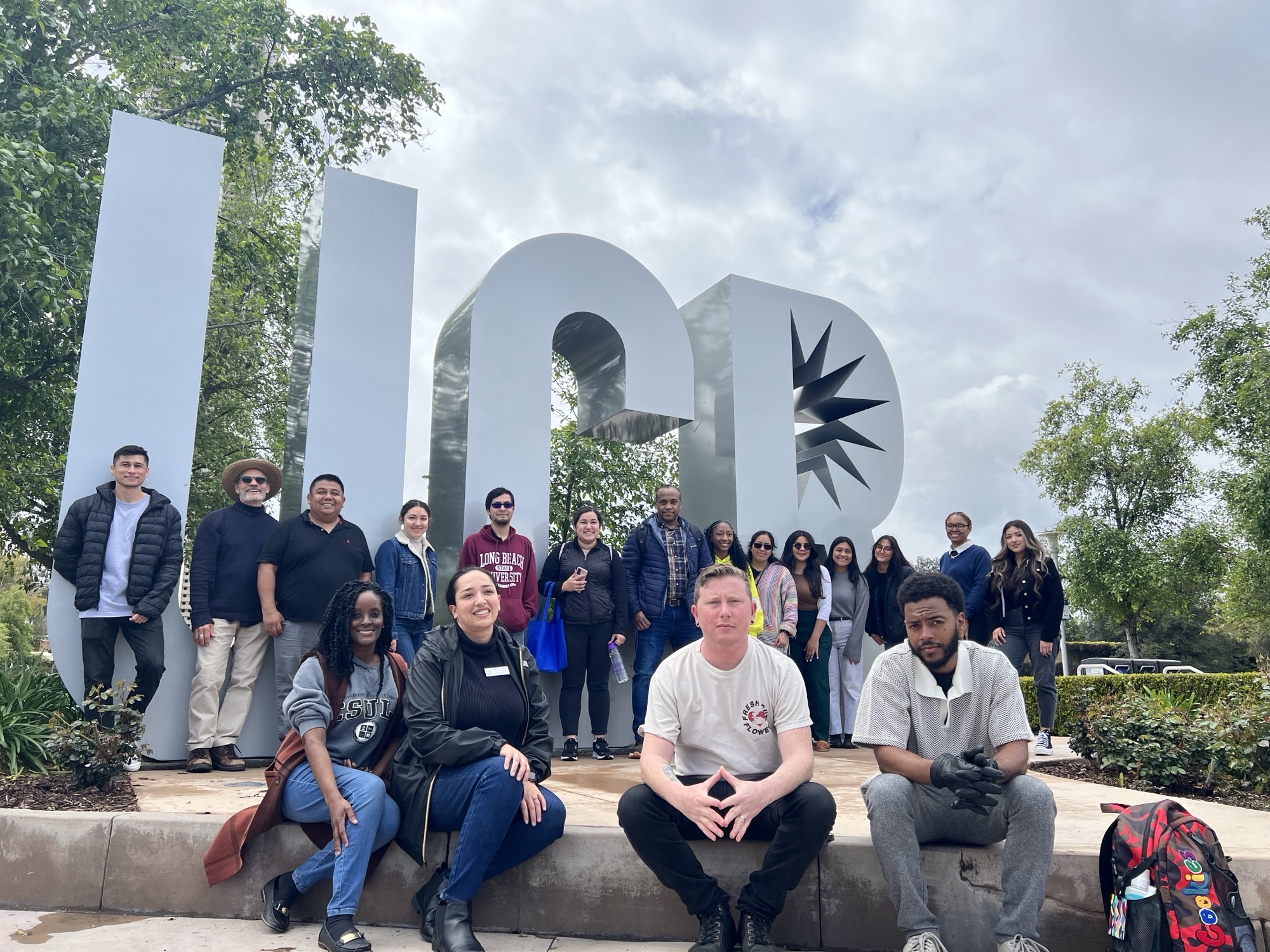 Group photo of SSS students in front of the UCR letters