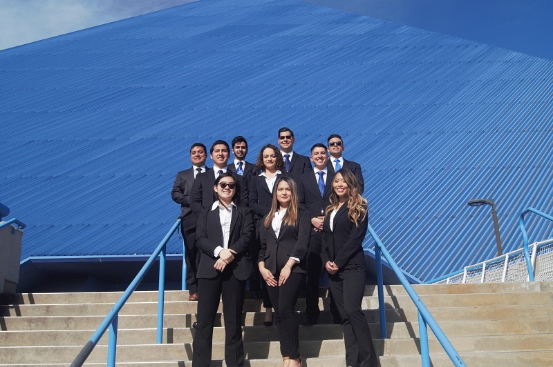 students in front of pyramid