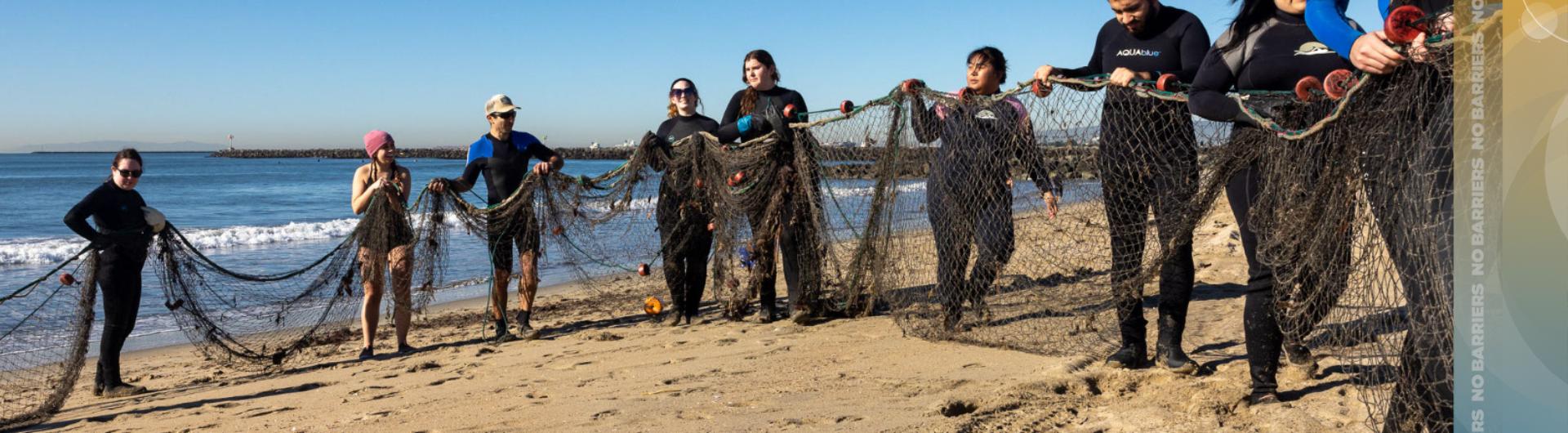Students pulling in nets
