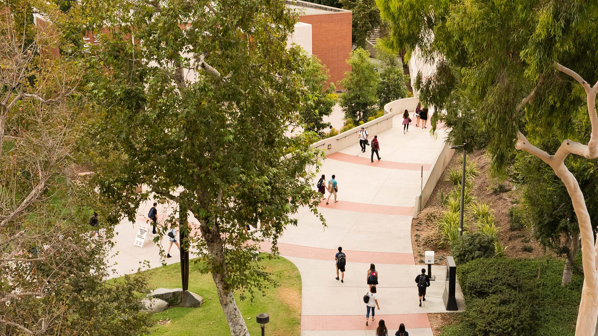 Aerial view of students walking across campus