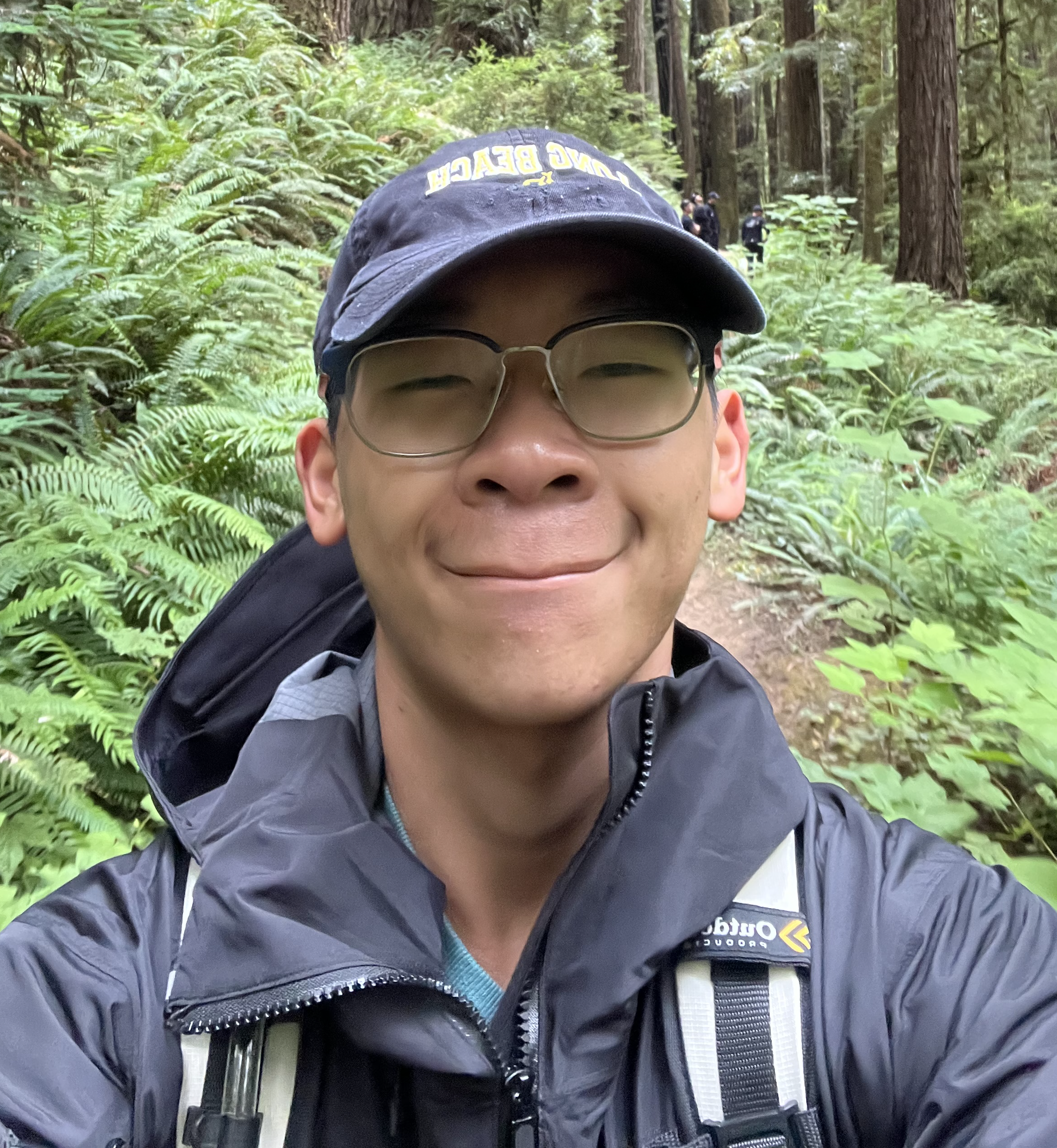 A photo taken of Harrison Nguyen on a hike outdoors.