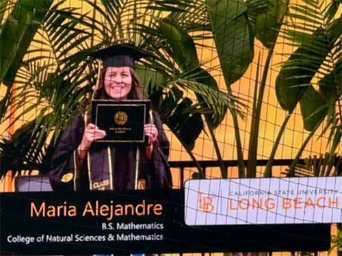 Maria receiving diploma