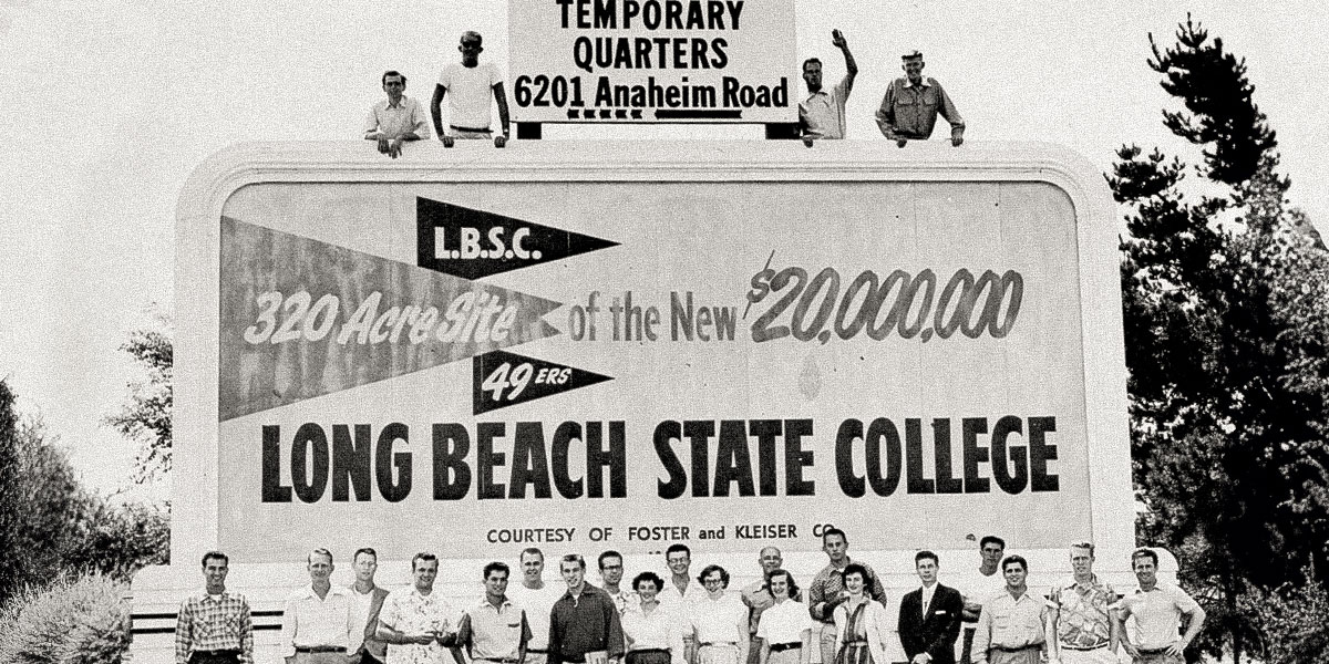 A historic black-and-white photo sign showing the future site of campus.