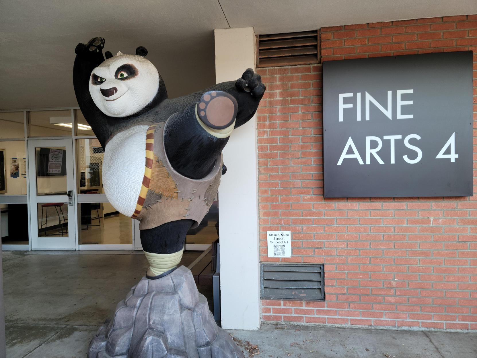 Kung Fu Panda statue stands outside Fine Arts 4