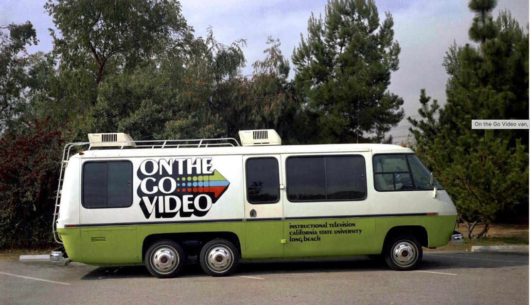 A van with "On The Go Video" written on the side