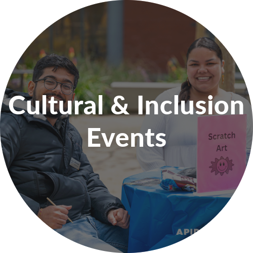 Two students smile. Text over the image reads, "cultural and inclusion events."