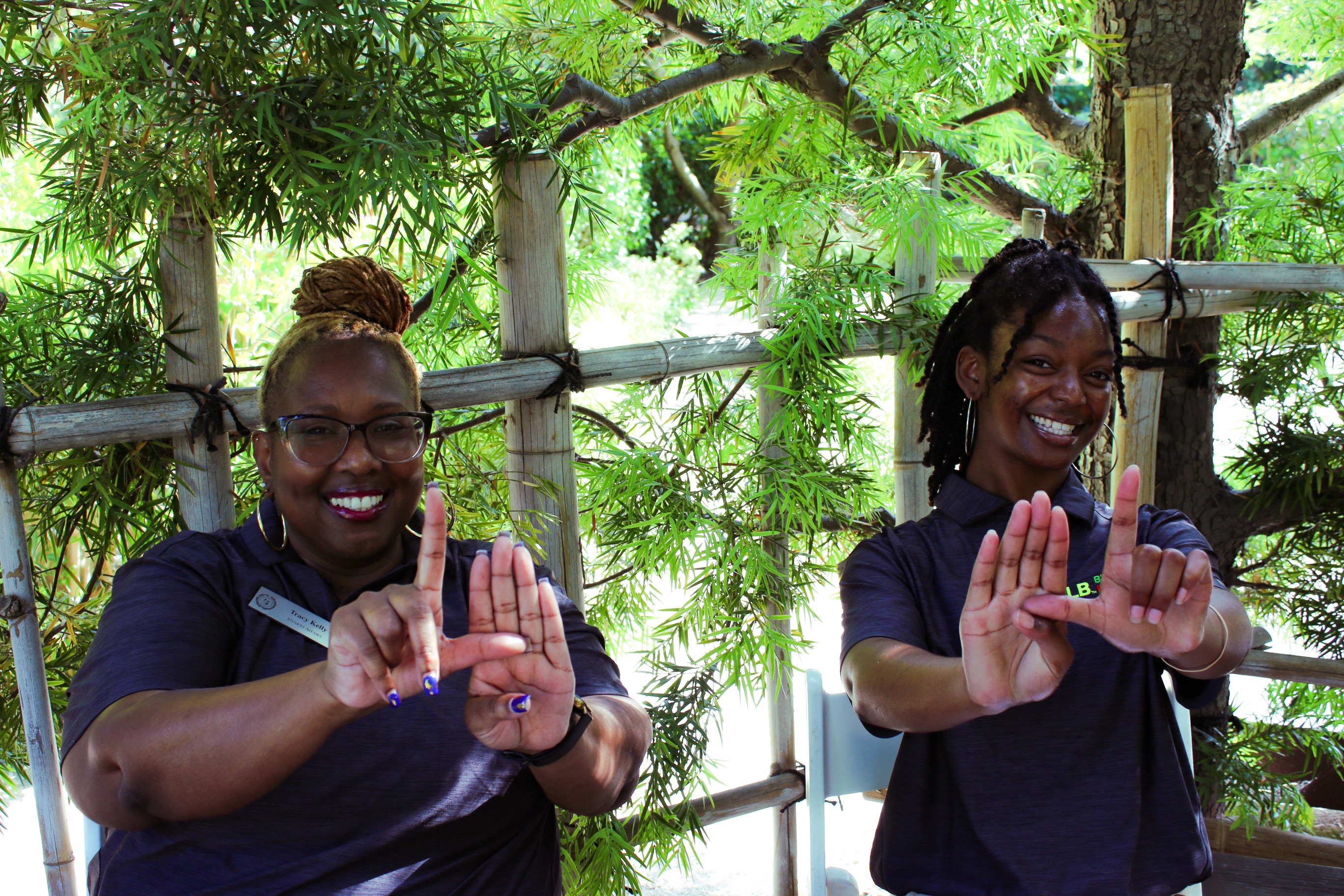 Tracy Kelly and Chloe Thomas tabling at the Black Excellence Experience