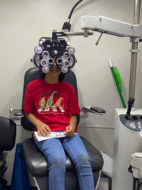 young kid undergoing eye exam