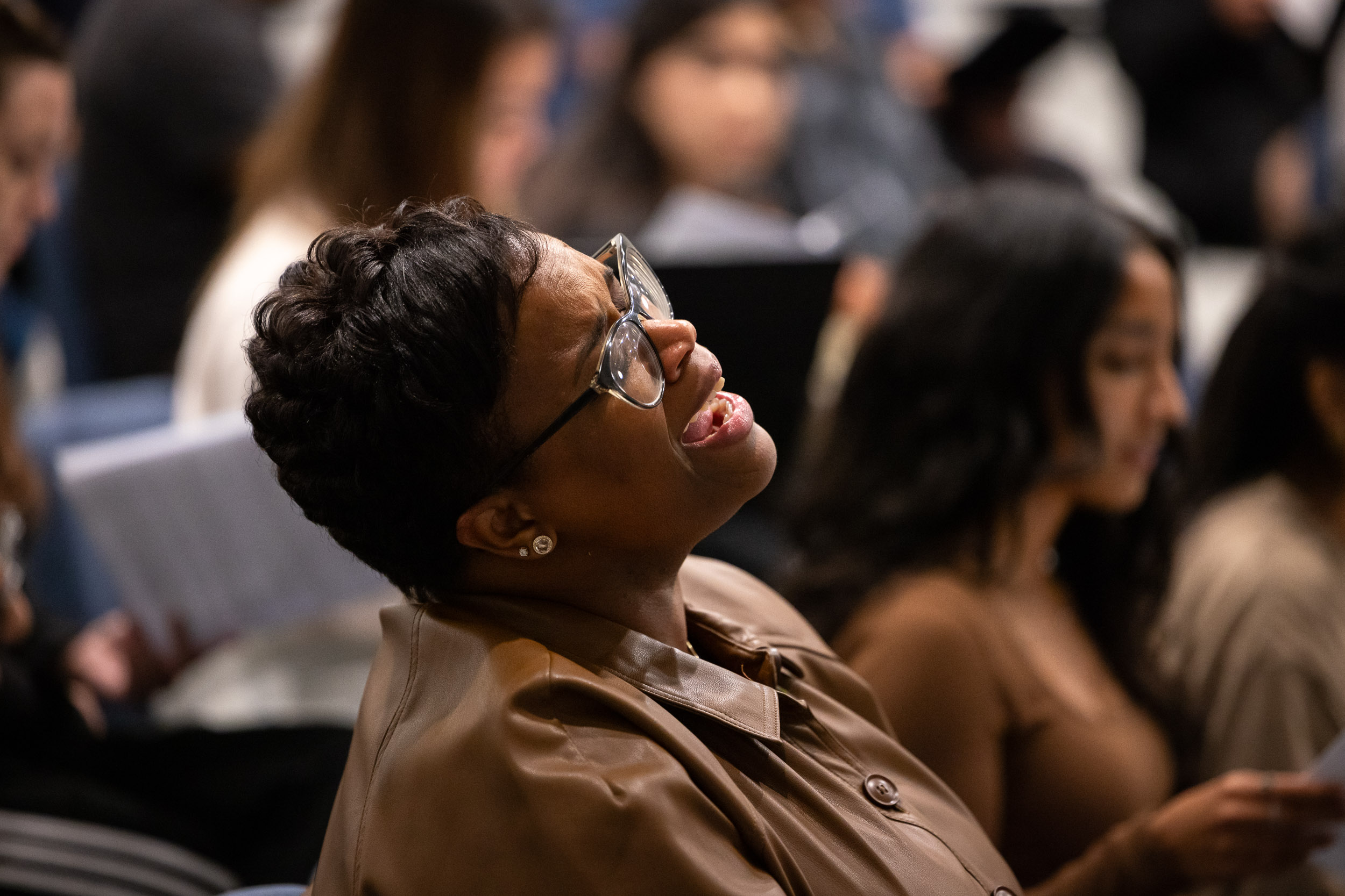 Daria-Yvonne Jackson Graham sings with emotion during a choral rehearsal.