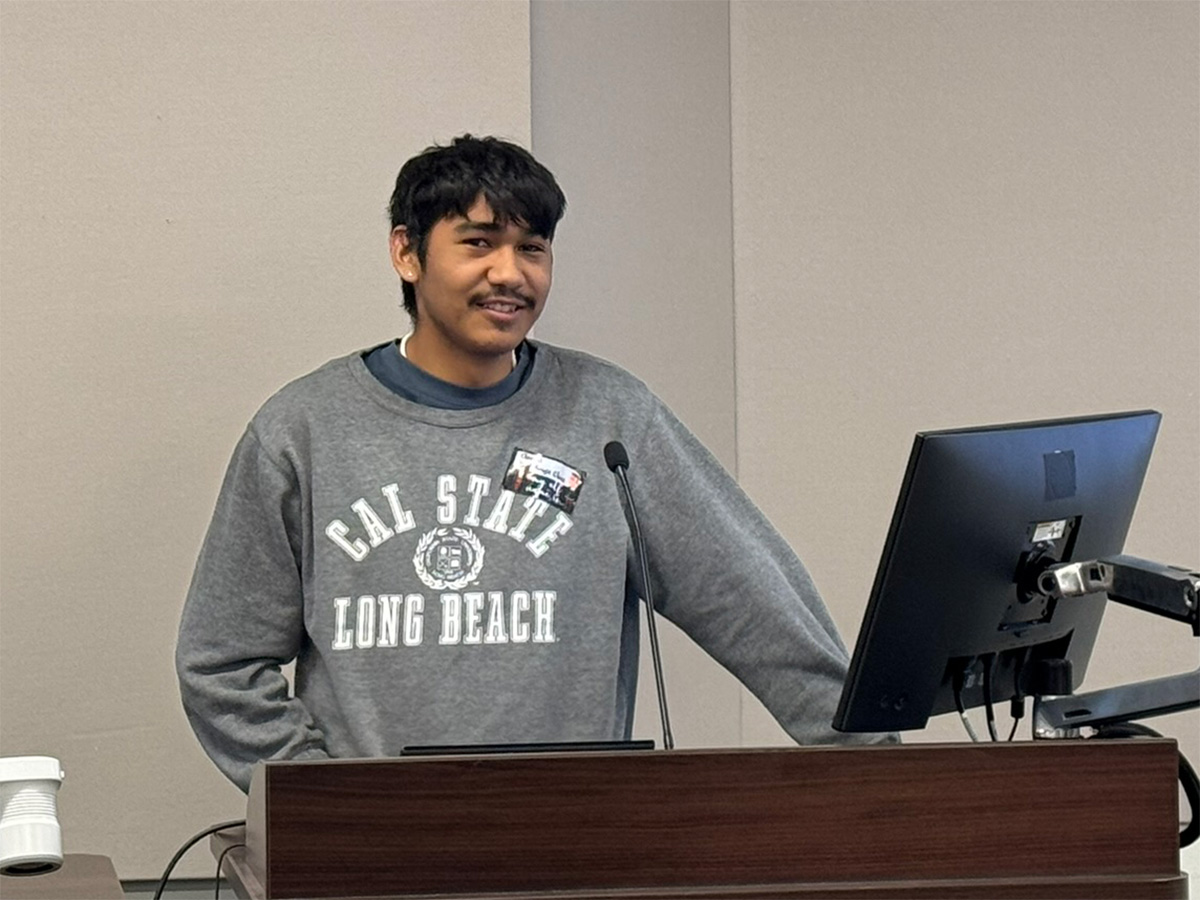 Javier Rios at a podium