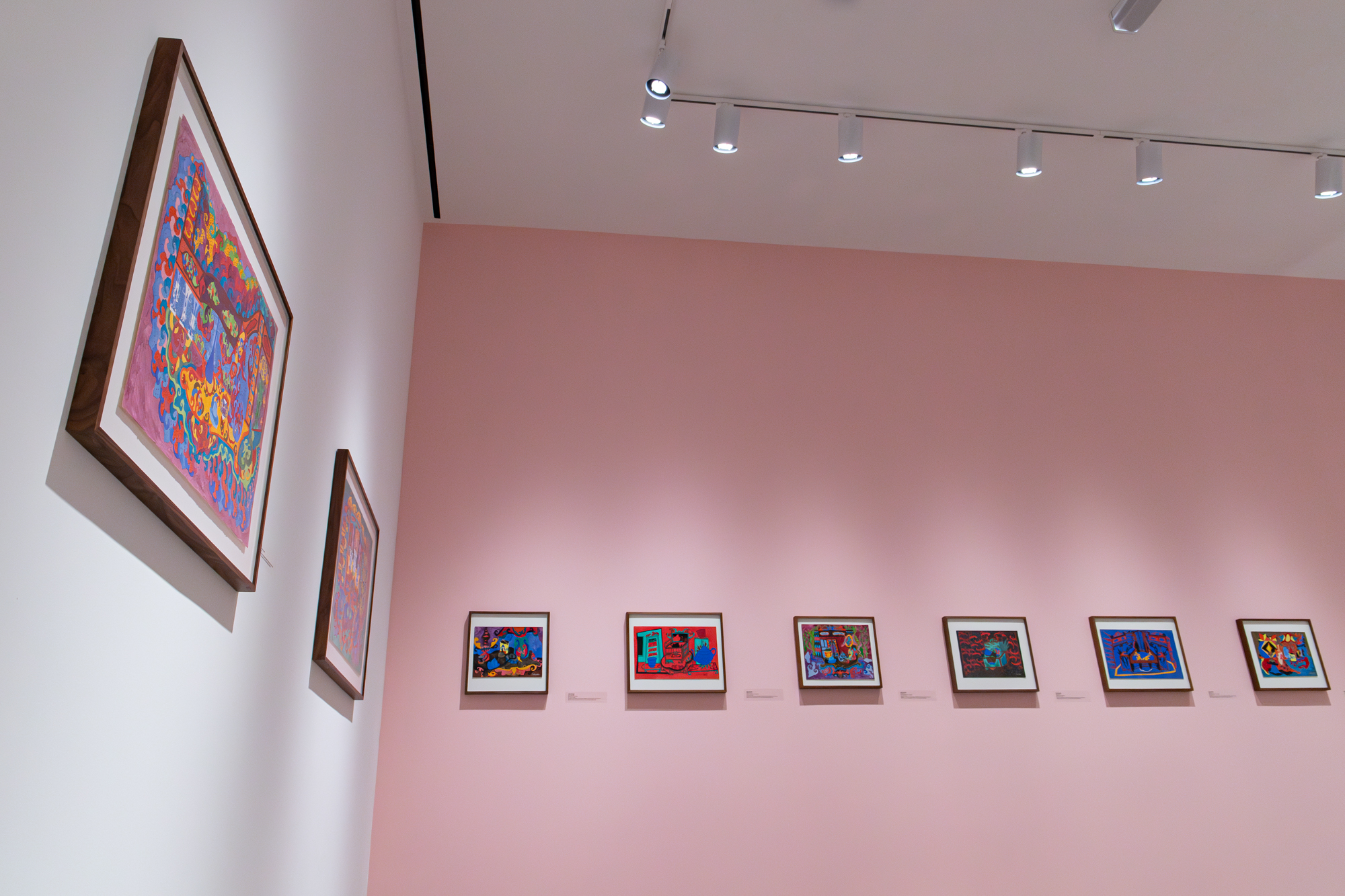 A wideshot photo of several artworks by artist John Schacht.