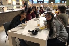 interns at dinner table