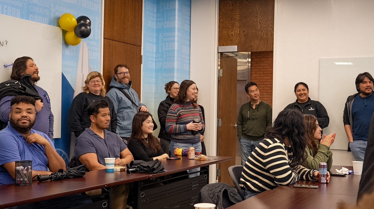 Staff members connect during Beach Staff Development Center open house.