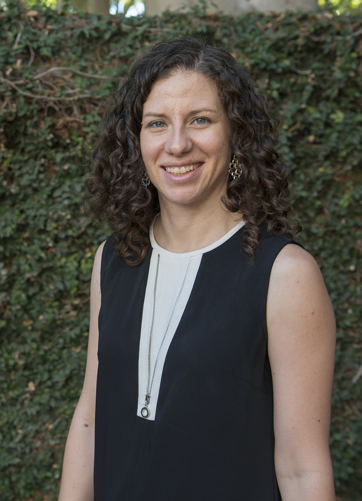 Christine El Ouardani in front of greenery