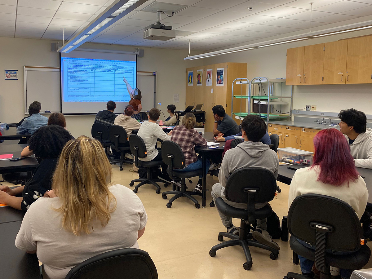 Amy Ricketts teaching students in a classroom