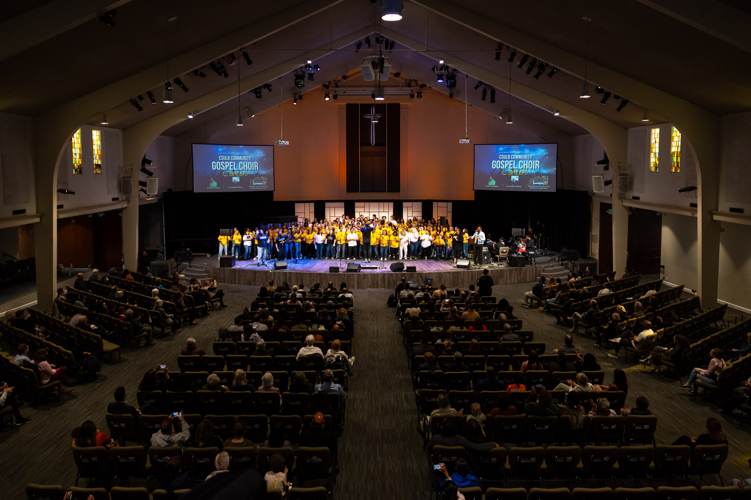 An audience watches a performance during the Community Gospel Choir Concert