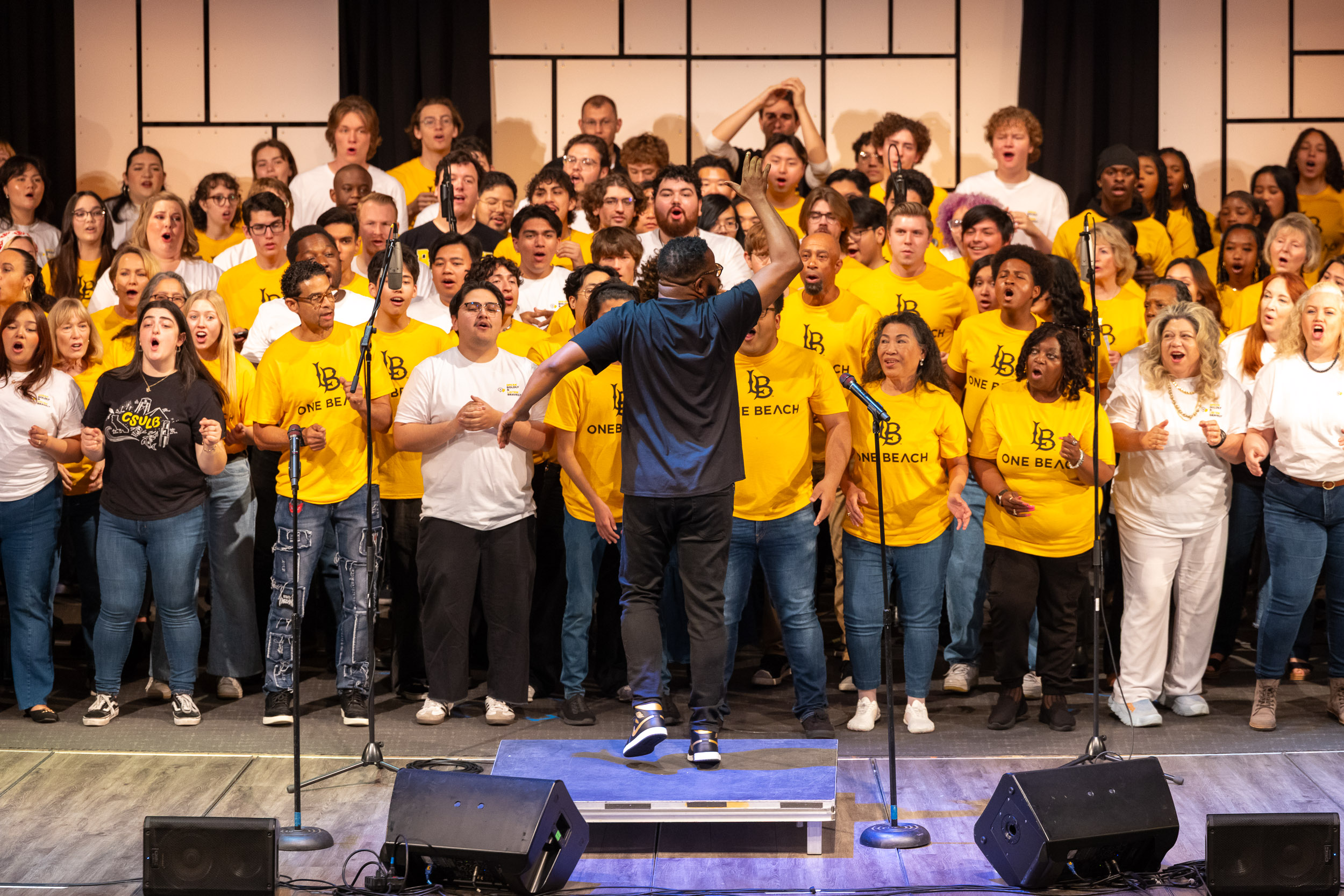 Members of the Community Gospel Choir Concert sing on stage