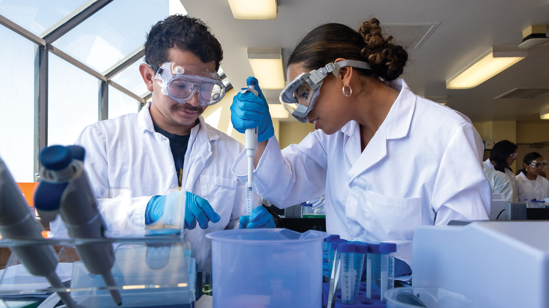 CSULB science students using a pipette CSULB science students using a pipette