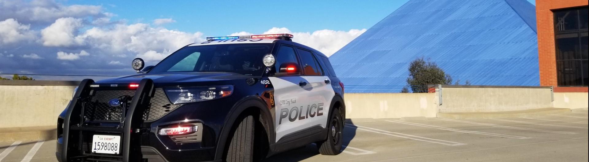 Police Vehicle in front of Pyramid