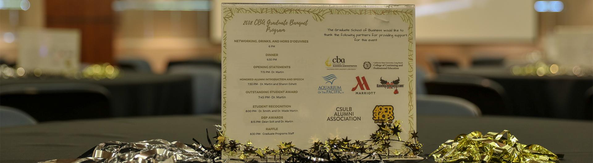 CSULB College of Business Graduate Banquet Table and Program