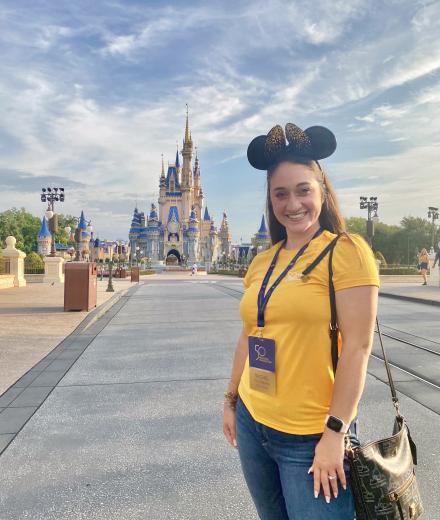 Rachel Posteraro in front of castle at Disney World