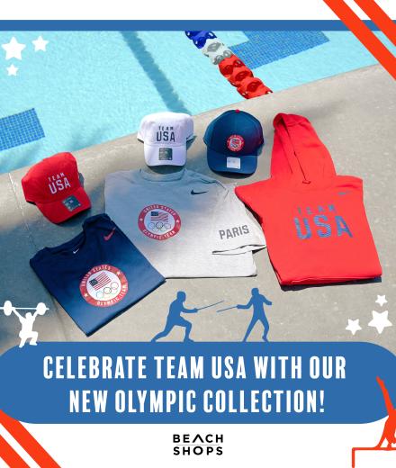Team USA merchandise on the concrete next to an olympic pool.