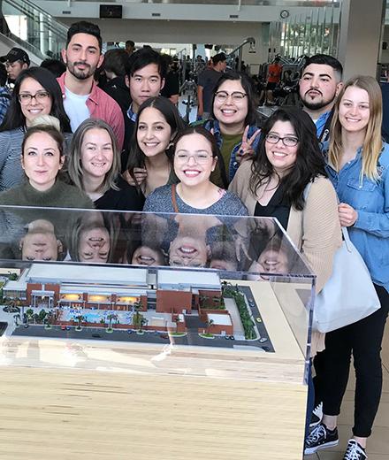 Photo of model building students