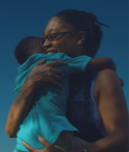 Through the Night Film Poster, woman hugging child