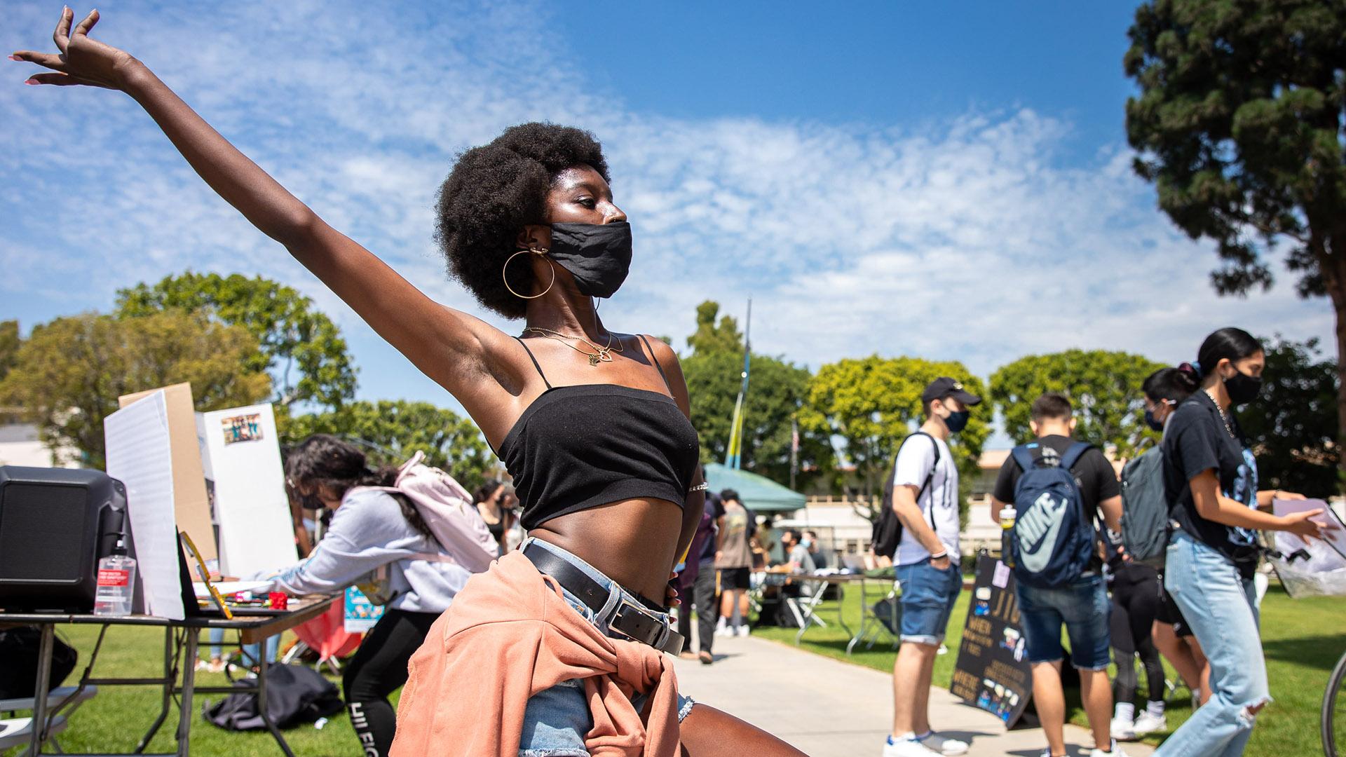 Woman poses at Week of Welcome