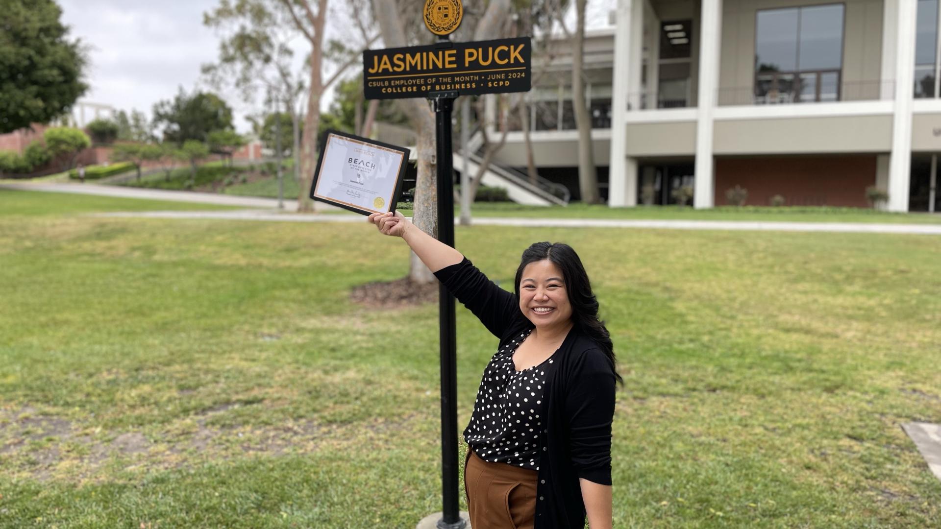 Jasmine Puck Award and her name sign on campus