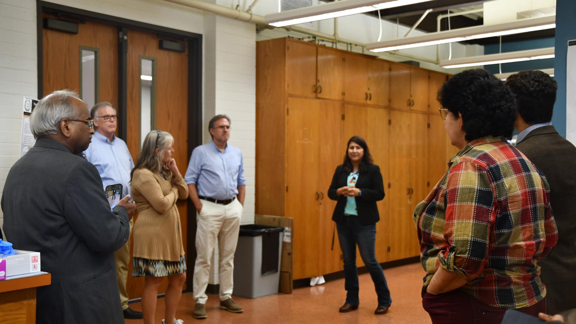 Several college of engineering deans in a classroom