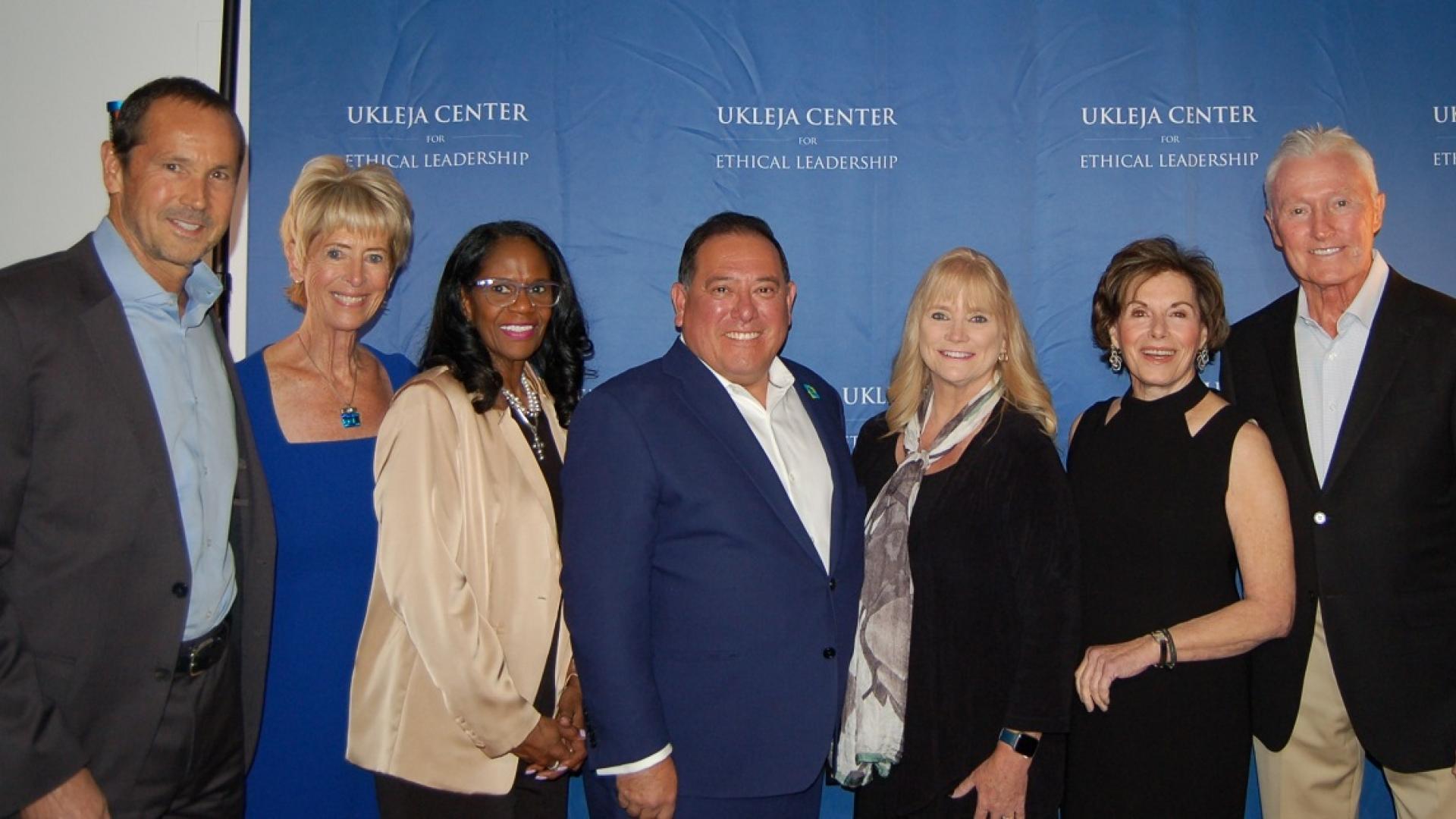 Greg Wooden, Janey Roeder, Karyn Scissum Gunn, Mark Guillen, Erin Garrity Rank, Louise Shakarian Ukleja, and Mick Ukleja at presentation of the 2024 Nell and John Wooden Ethics in Leadership Award