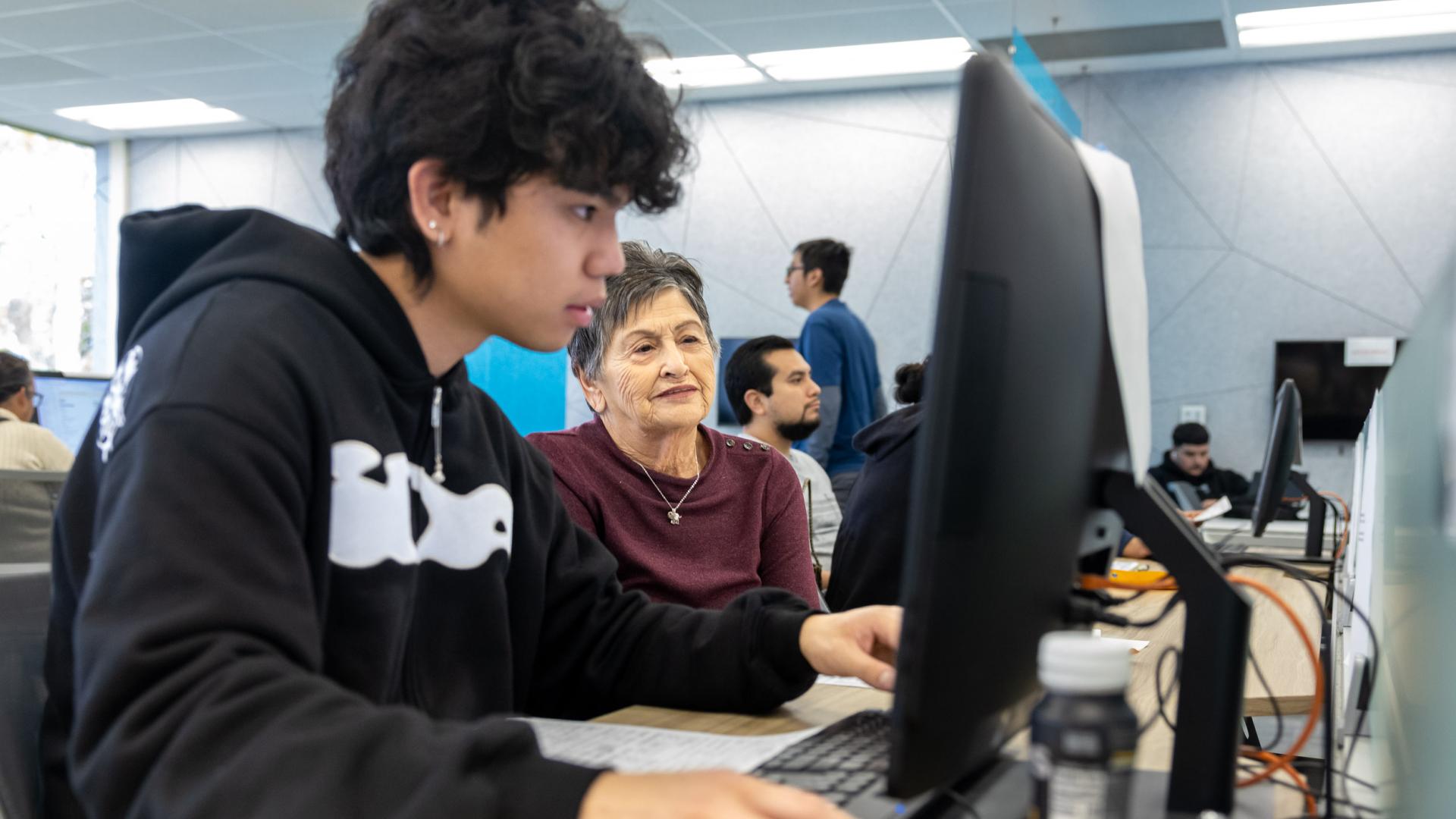 Student in COB LAB helping with a Ladytax preparation