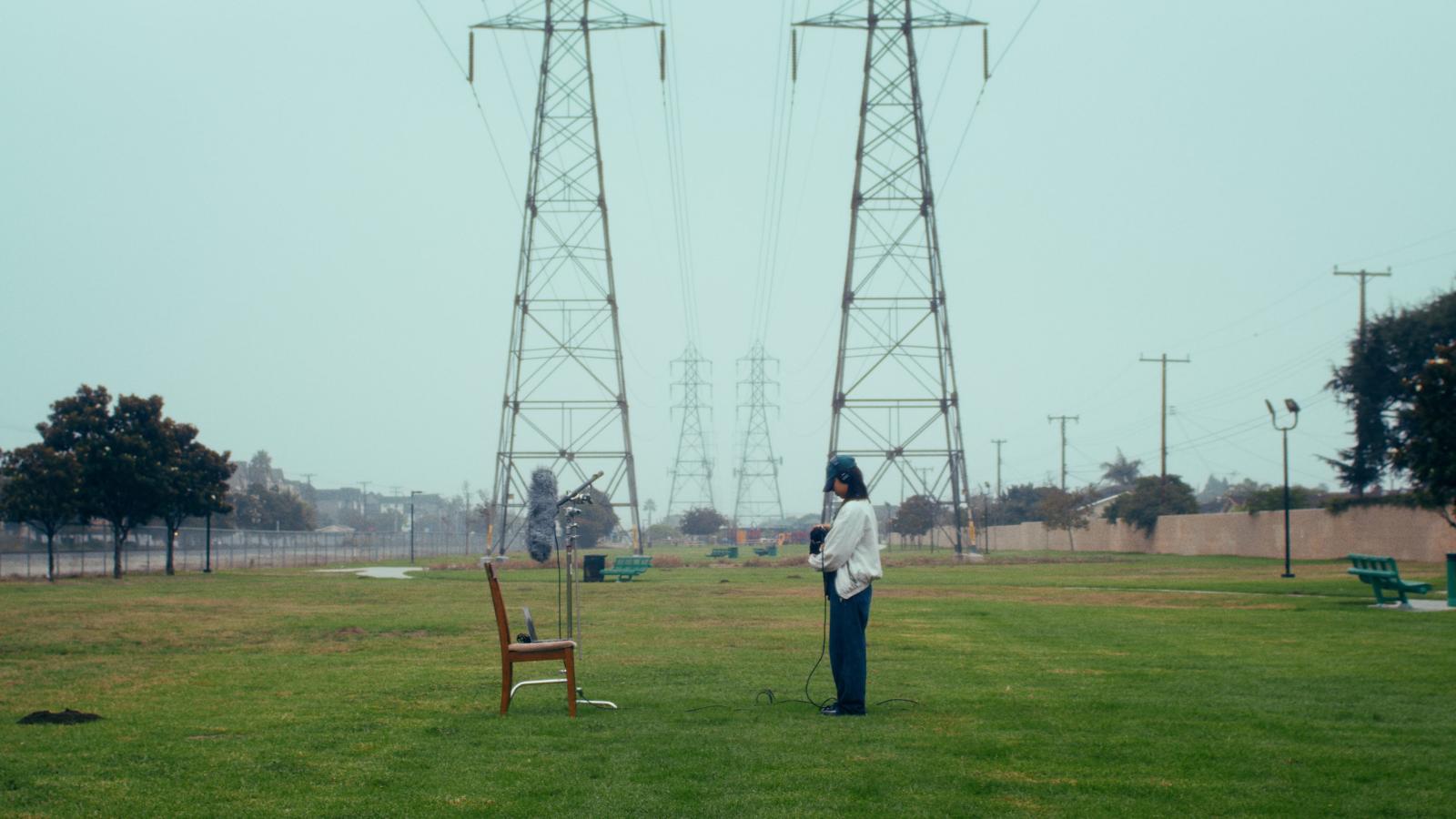 Grassy lawn with chair and girl