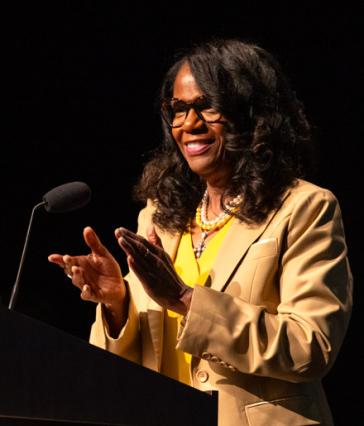 Provost Karyn Scissum Gunn at the podium during Convocation 2024