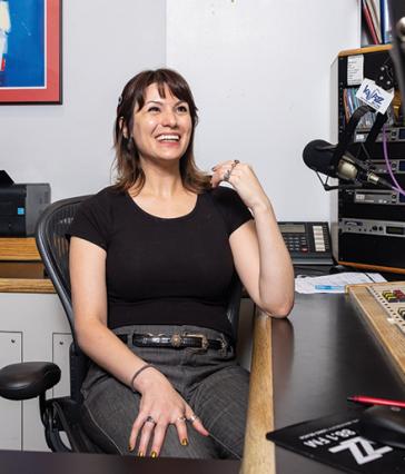 Amanda Thomas sits in the KKJZ studio