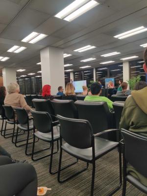 crowd seated in library