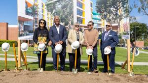 President Jane Close Conoley, Long Beach Mayor Rex Richardson and three others posing with shovels at the La Playa Hall groundbreaking 