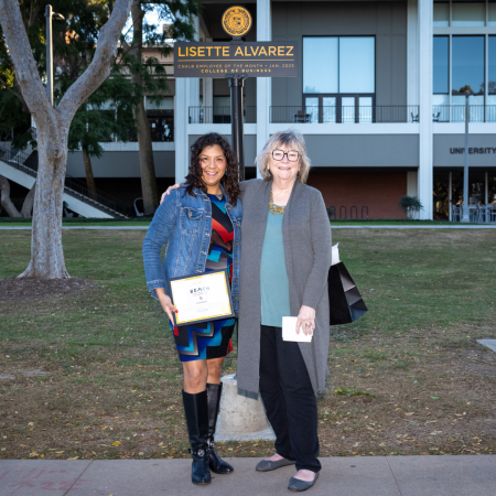 Lisette Alvarez, left, and CSULB President Jane Close Conoley