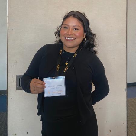 Alexandra Martinez took first place in the non-STEM category of the Grad Slam, a campus-wide competition for the best graduate student research presentation.