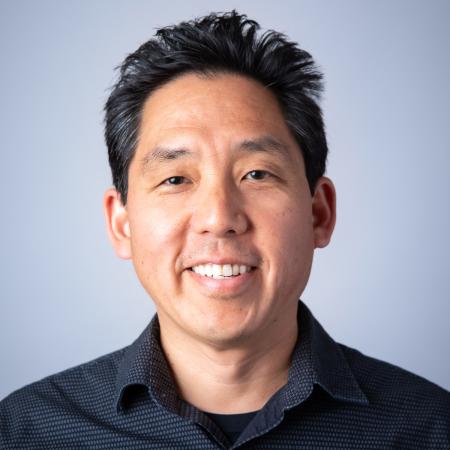Richard Chang Headshot of a man with dark hair and shirt