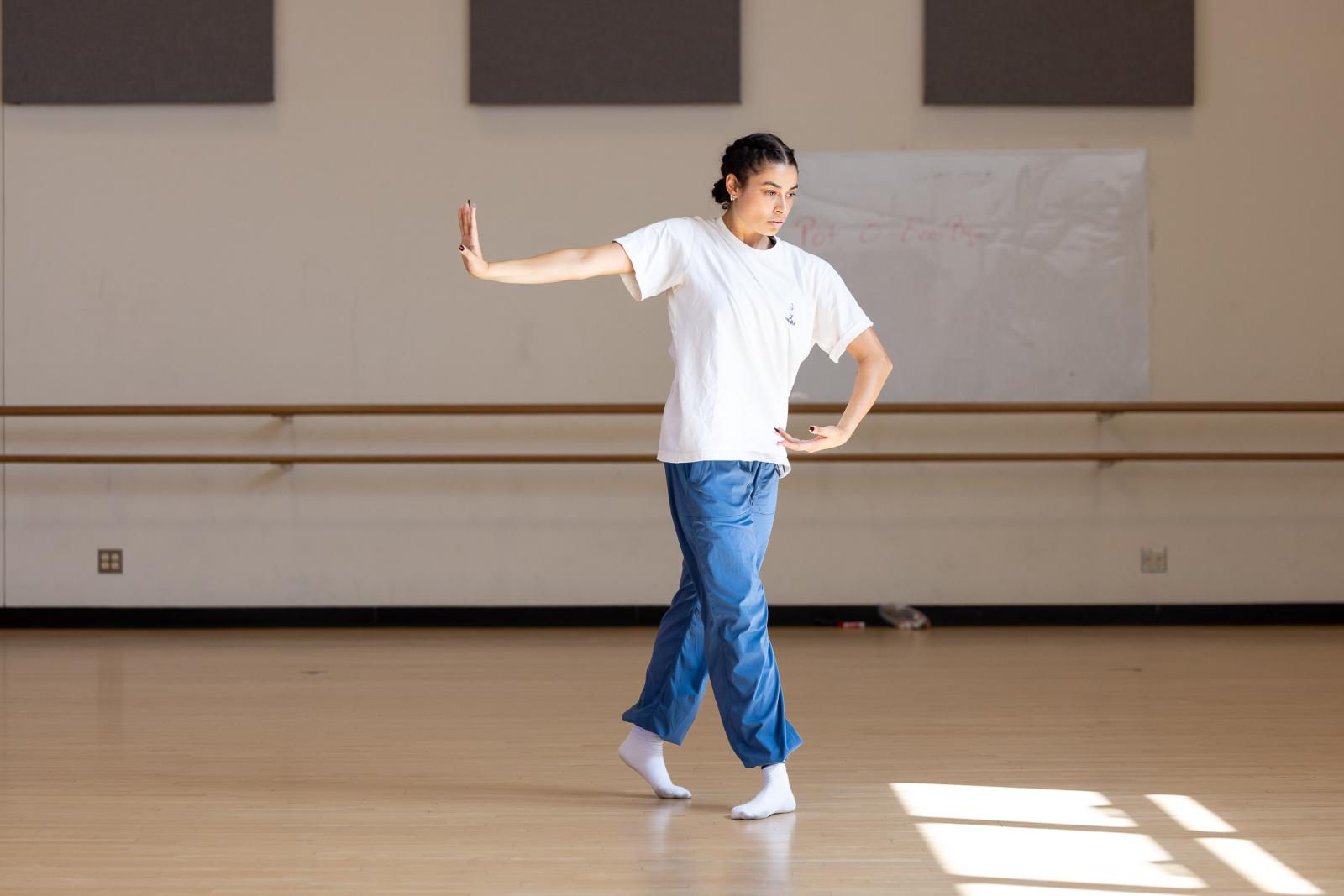 An MFA dance student during a workshop led by professional dancers