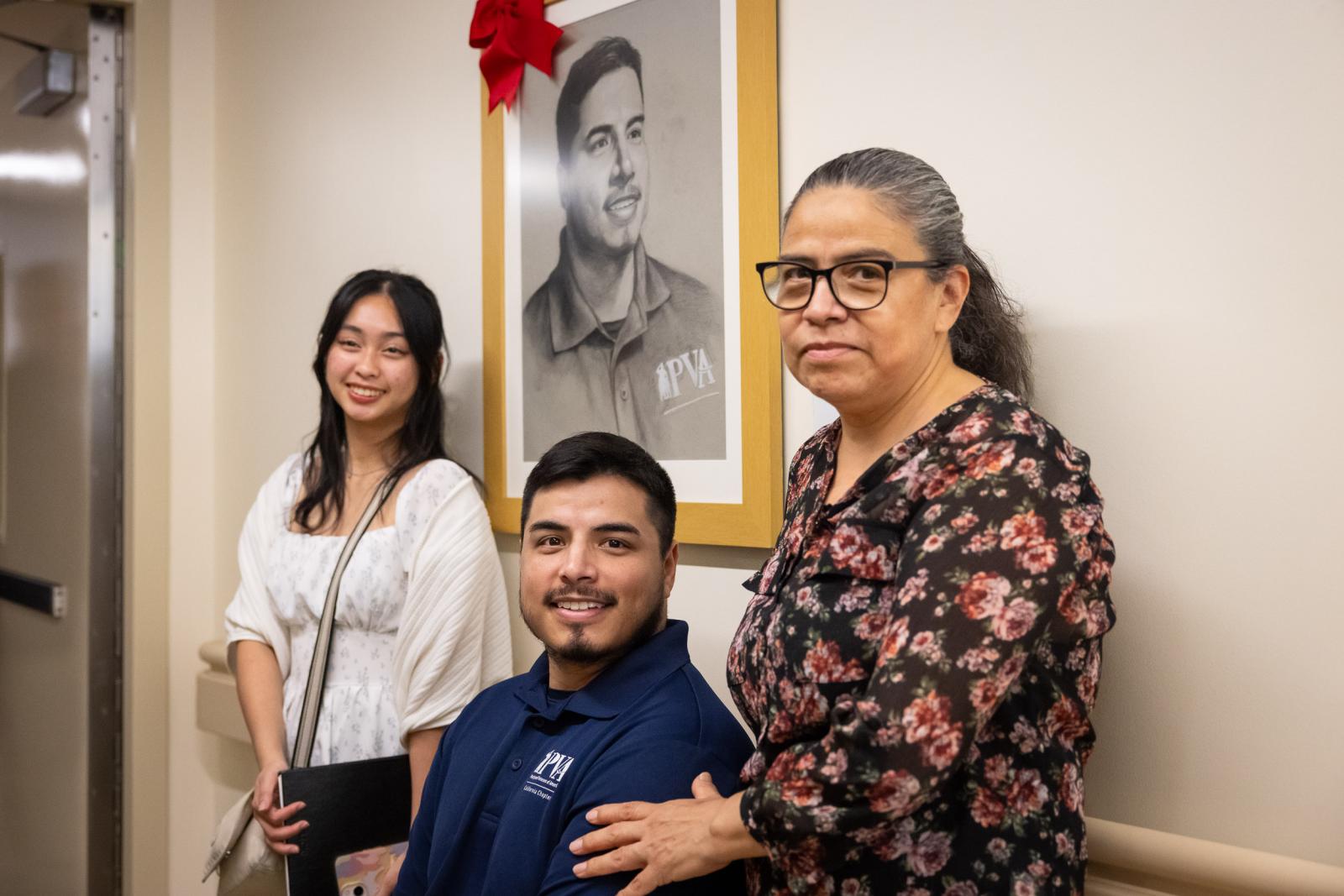 From left: Carina Tan, Jose Reynoso and his mother