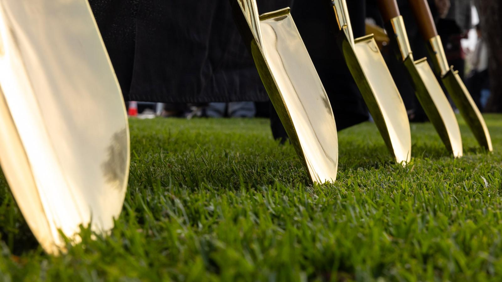 Shovels on grass used for La Playa groundbreaking