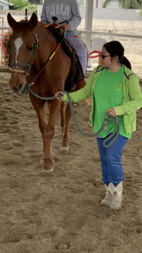 student with horse